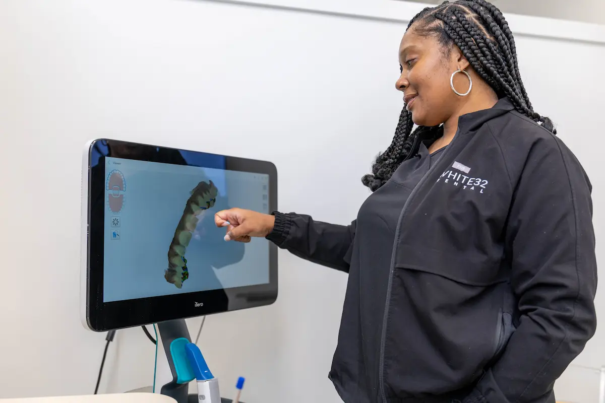 A White32 Dental clinician reviewing a digital scan