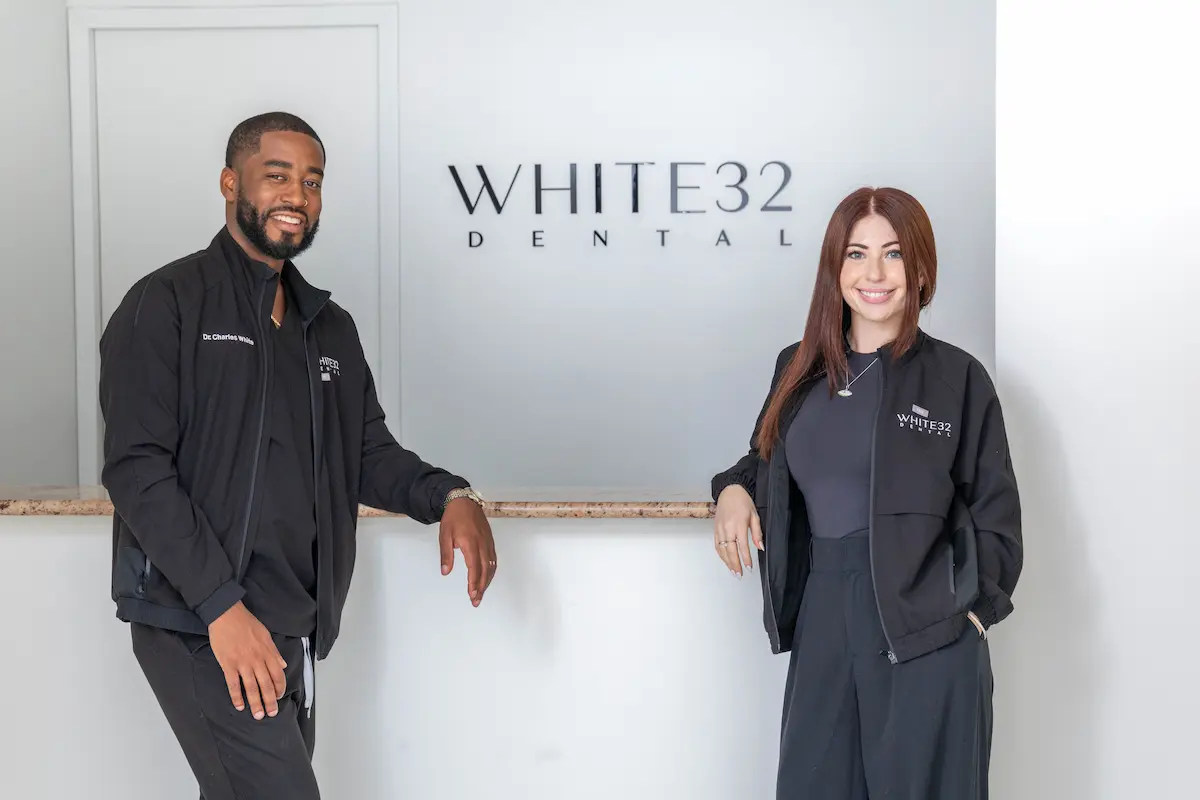 Dr. Charles White with a White32 Dental team member at the practice in Foxhall Square